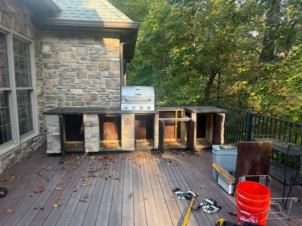 Built-in grill island on the deck during early dismantling
