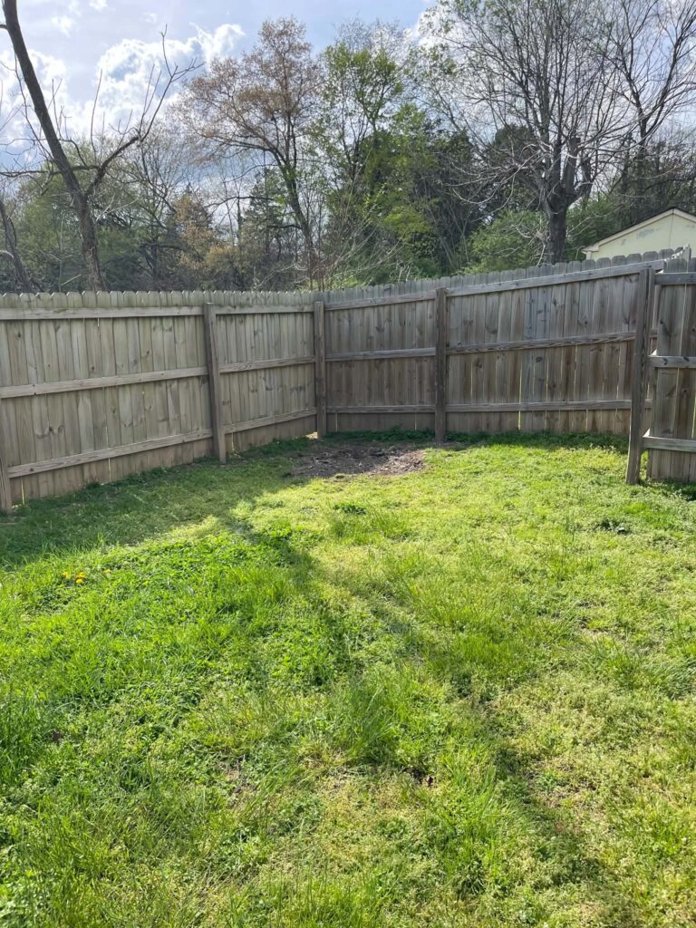 Open yard area after the outdoor fireplace was removed
